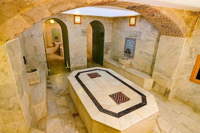 Century Hamam marble bathing platform and stone arches in Göreme, Cappadocia